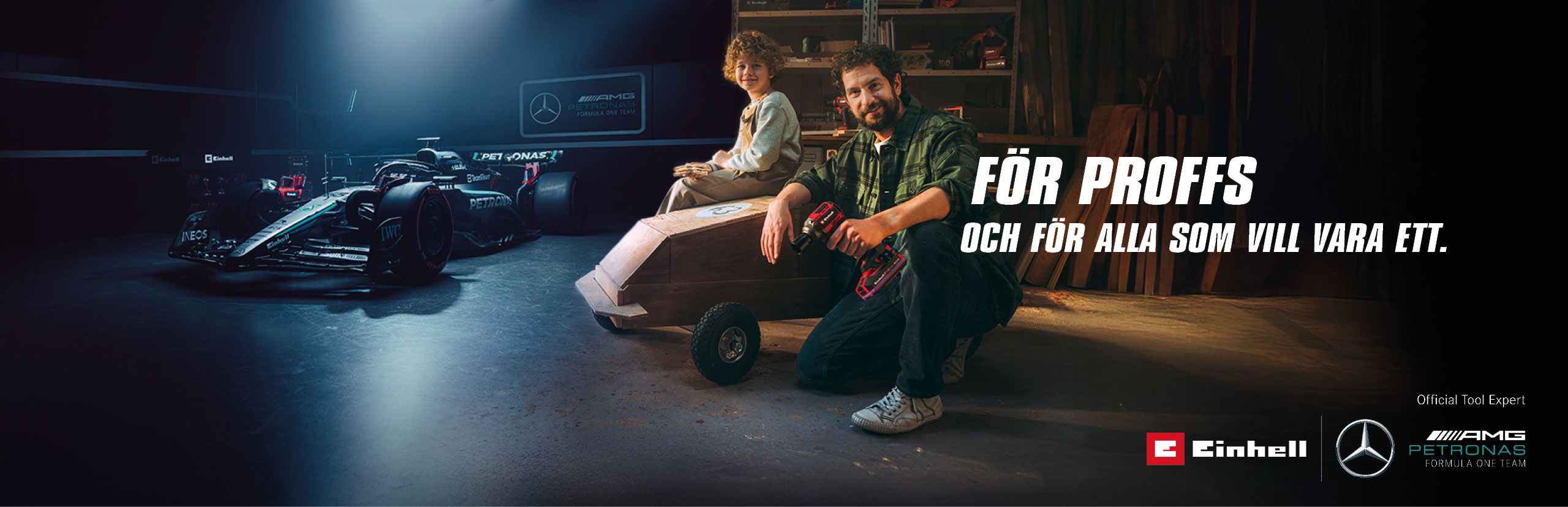 En far och ett barn i en verkstad med en hemmagjord lådbil. I bakgrunden står en Mercedes-AMG PETRONAS Formel 1-bil och Einhell-verktyg. Text till höger: ”För proffs och för dem som vill bli det.”